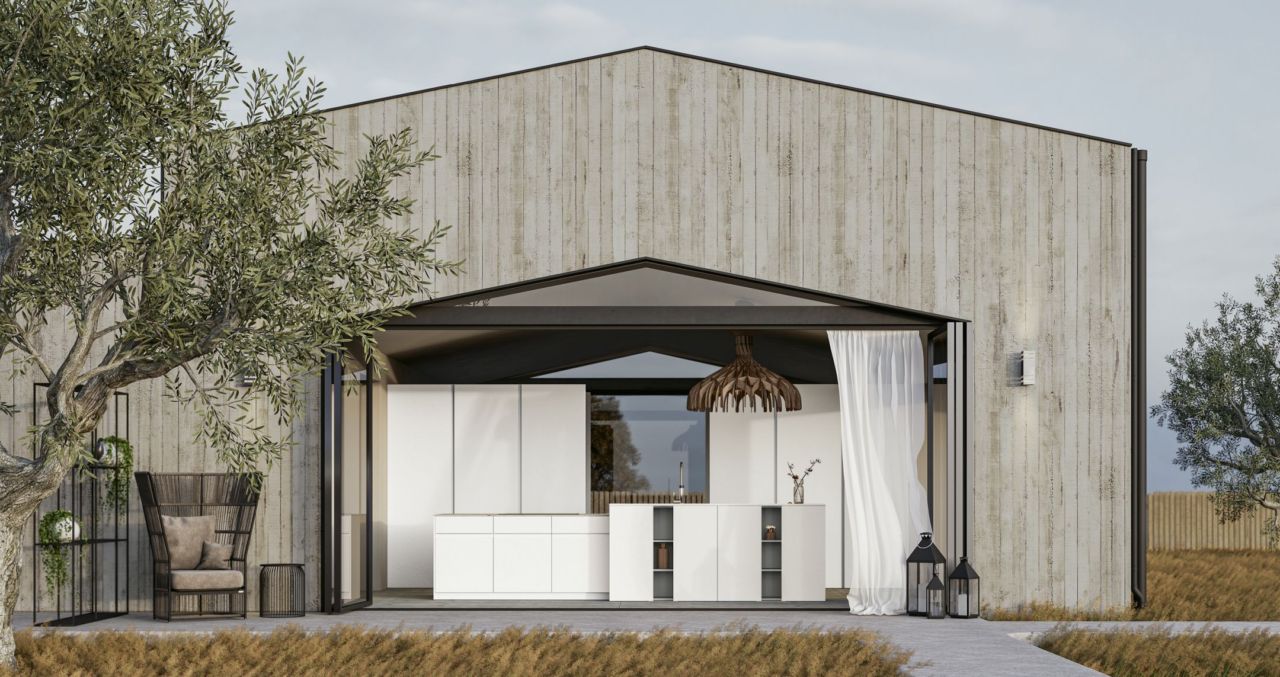 La colonna-monolite: la cucina ridefinisce gli spazi